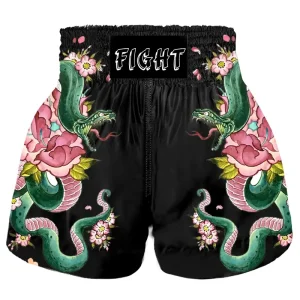 Short femme boxe thai noir et vert avec serpent Fight